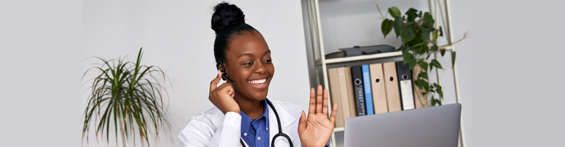 African female doctor talk to patient by telemedicine online webcam video call